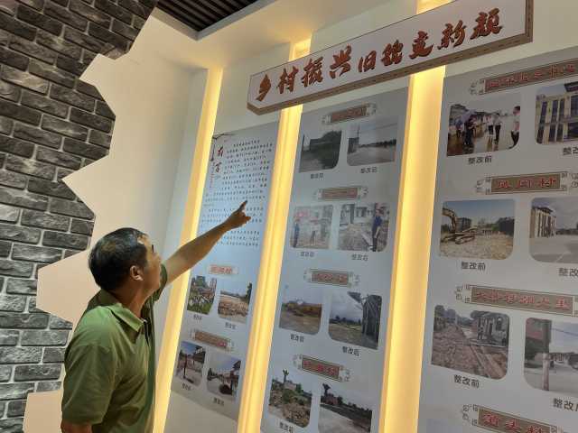 平原村書記吳振述向記者講述村子蝶變的經(jīng)過。伍思懿 攝 